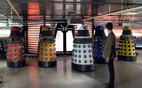 [The Doctor faces the new Daleks.]